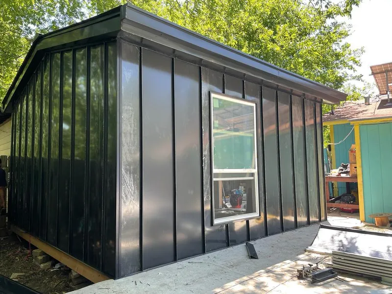 Black standing seam metal wall panels for Metal Roof Installation in Verona